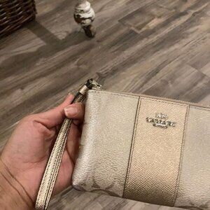 Coach Corner Zip Wristlet In Signature Canvas